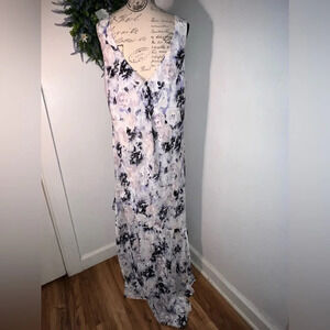 Floral, sleeveless, tiered, textured, flowing, deepV front and back,lined maxi